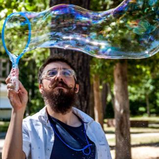 Bon Jurke aka Catfish aka Jonathan playing with bubbles one fine summer of day's past.